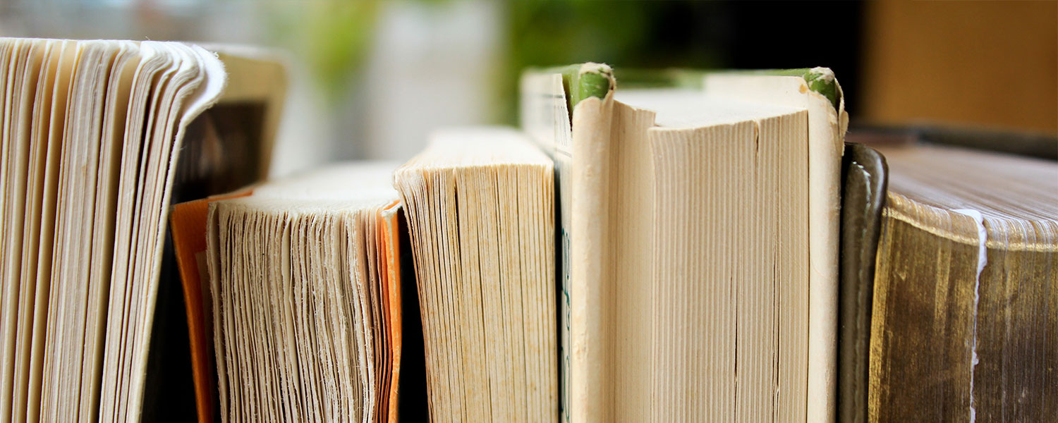 novels stacked in a row